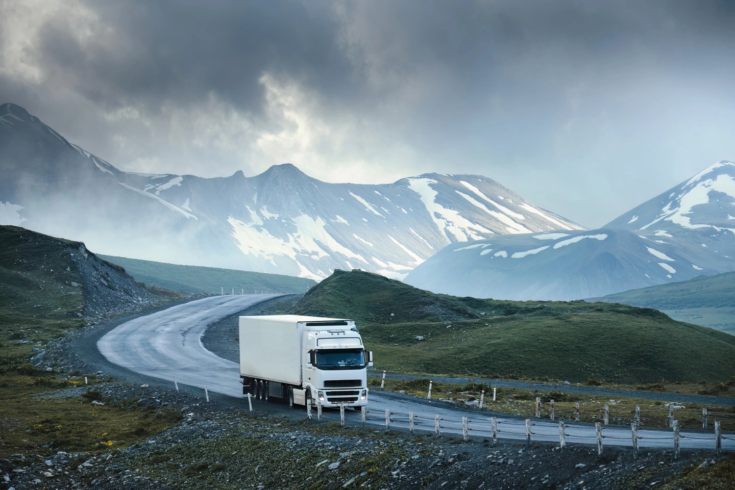 truck driving on a mountain road truck driving on a mountain road