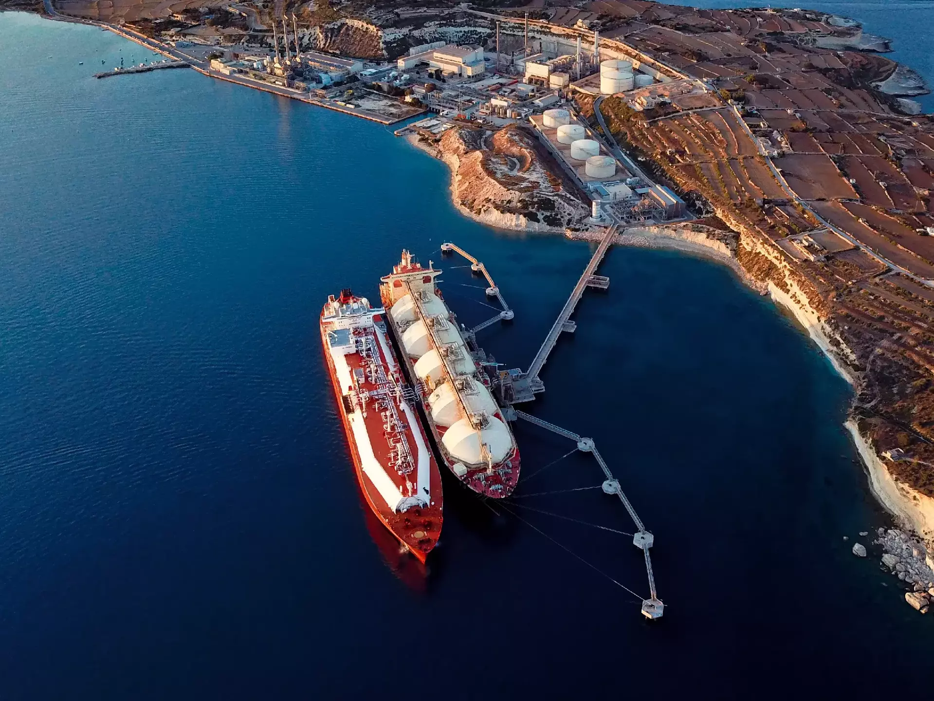 Aerial view of liquefied natural gas Ing tankers moored at harbour Aerial view of liquefied natural gas Ing tankers moored at harbour