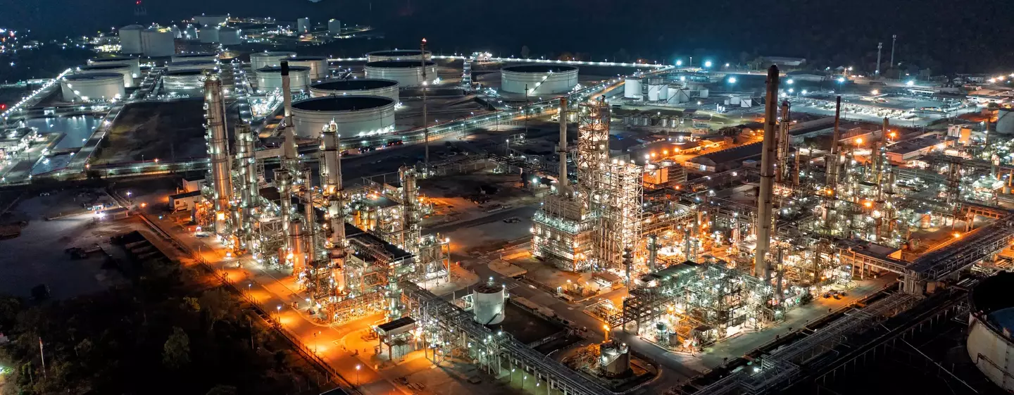 Aerial view of oil refinery at dusk
