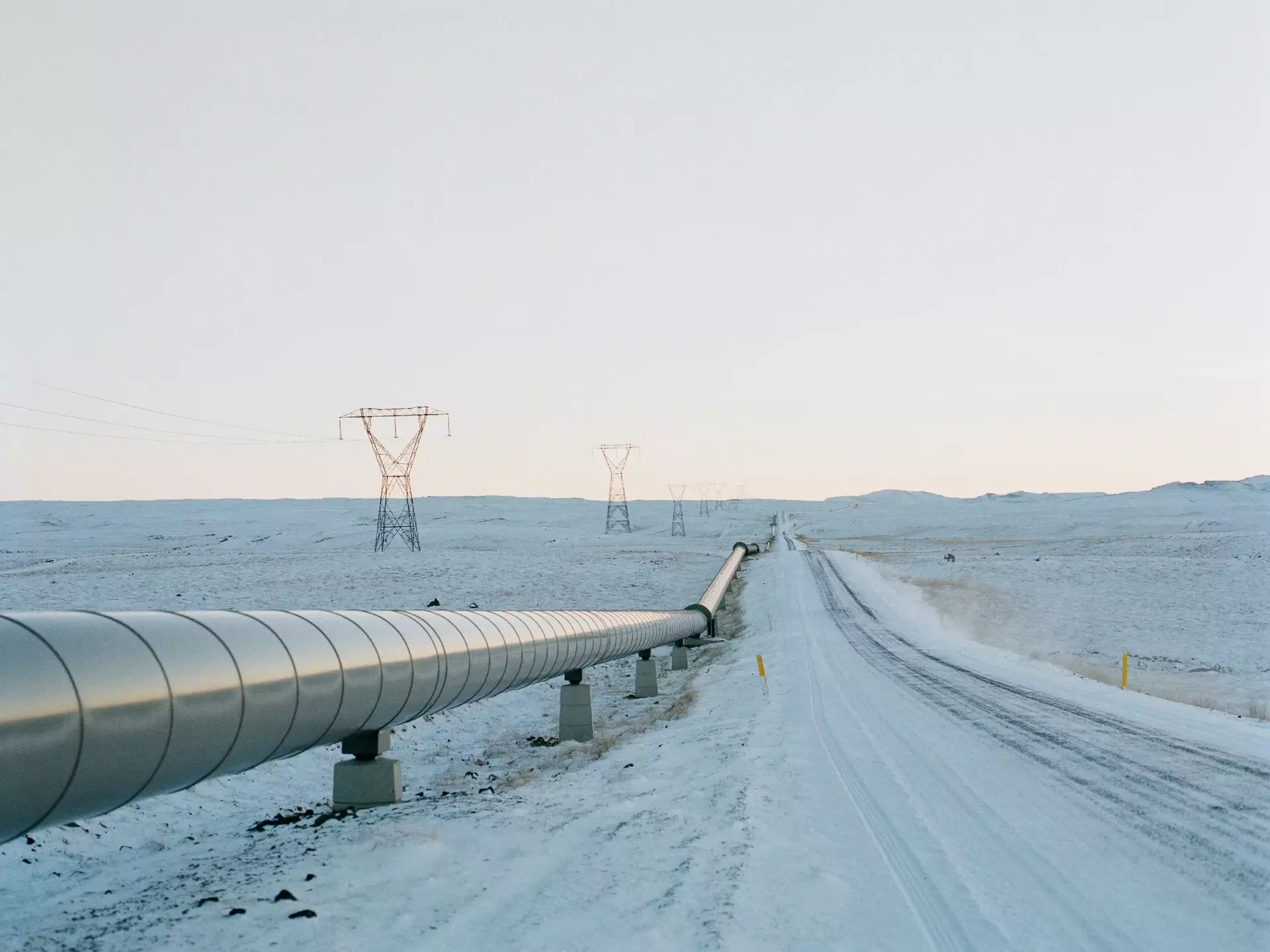 Geo thermal pipeline by snowy road Geo thermal pipeline by snowy road