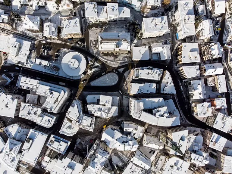 Overhead view of snow covered roofs switzerland Overhead view of snow covered roofs switzerland