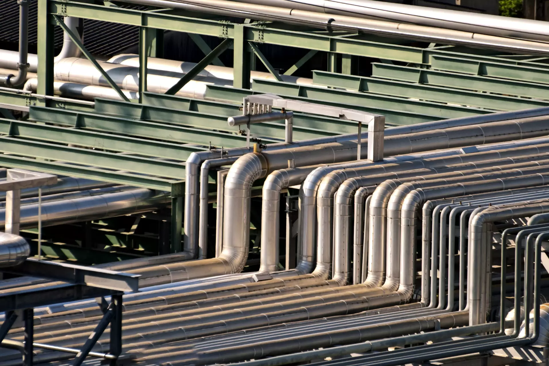 Piping as found inside of industrial petrochemical oil refinery plant Piping as found inside of industrial petrochemical oil refinery plant