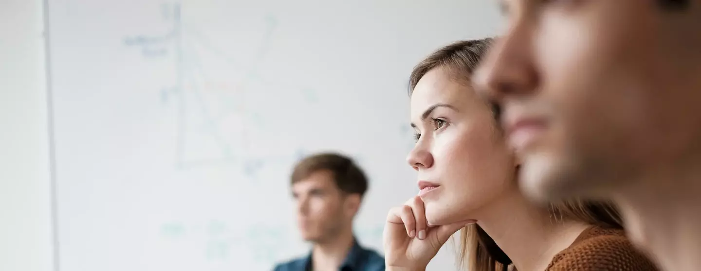 Student listening in college classroom Student listening in college classroom