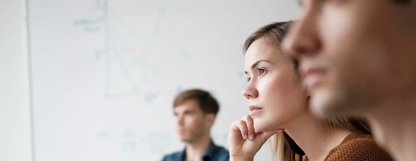 Student listening in college classroom Student listening in college classroom
