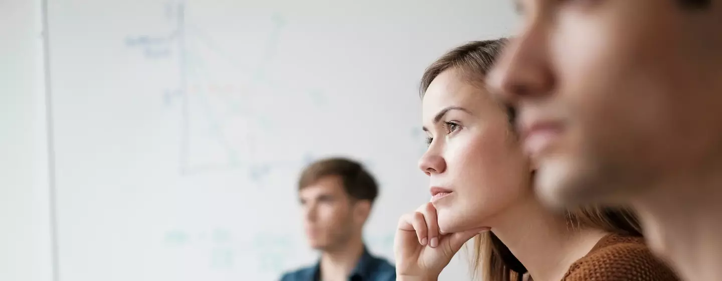 Student listening in college classroom Student listening in college classroom