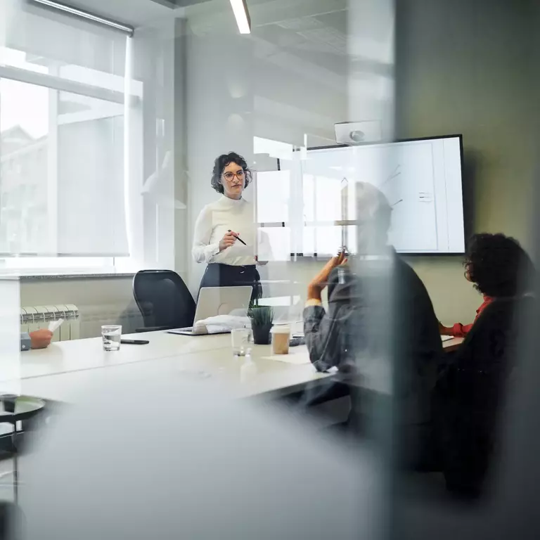 Woman presenting numbers for financial growth