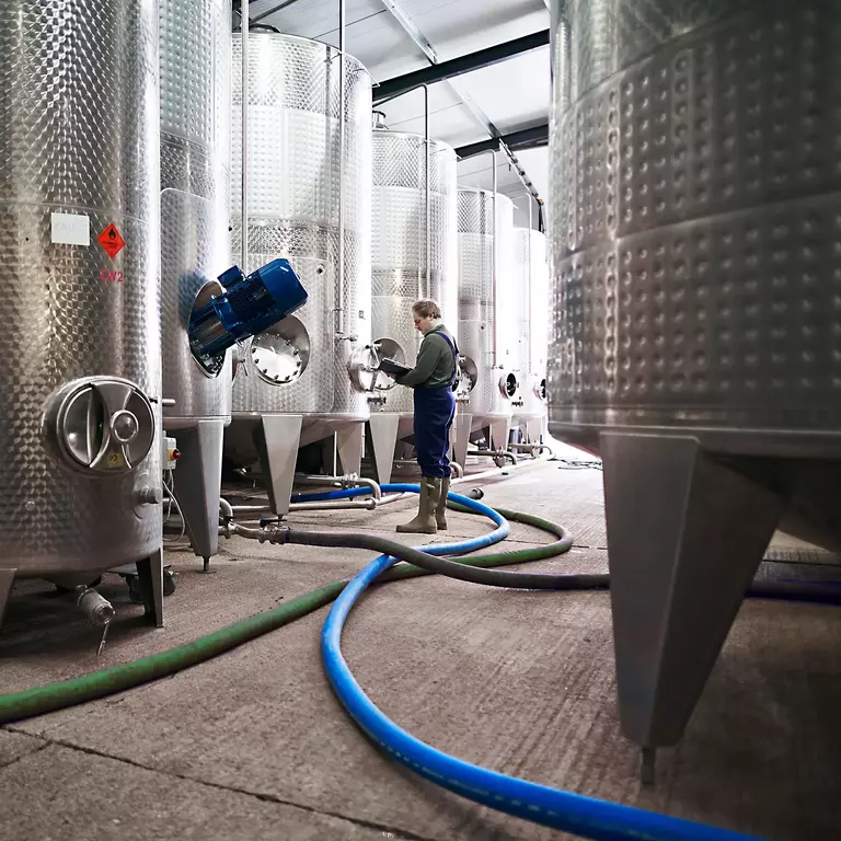 Workers at a distillery
